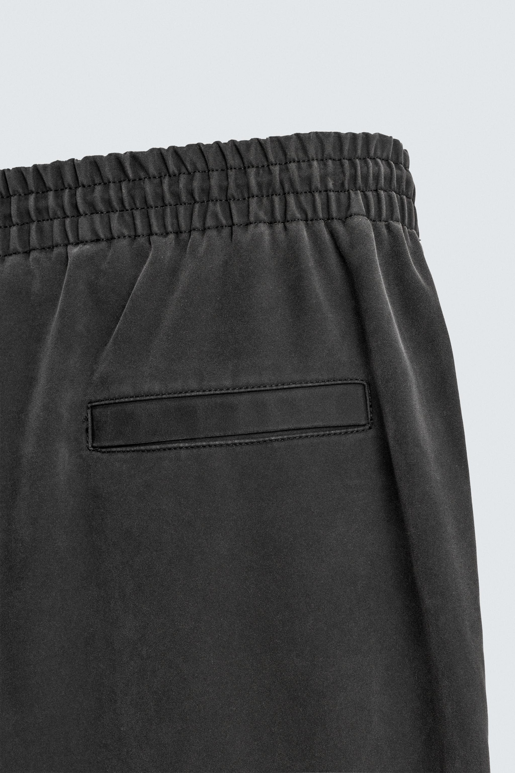 STUDDED FAUX LEATHER RELAXED FIT PANTS